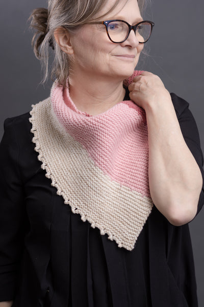 designer modelling a handknit cowl