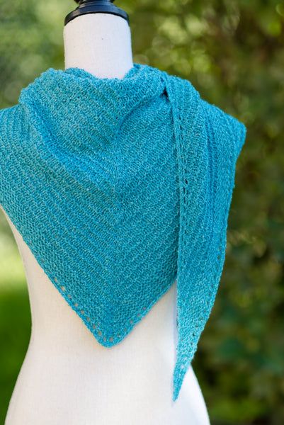 Handknit Shawl From Pattern draped on a Mannequin