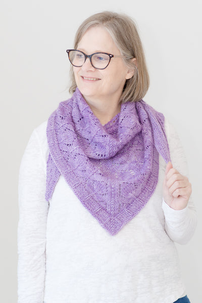 Designer modelling handknit lace shawl