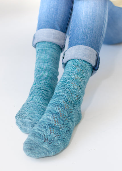 Close up of Handknit socks with Lace
