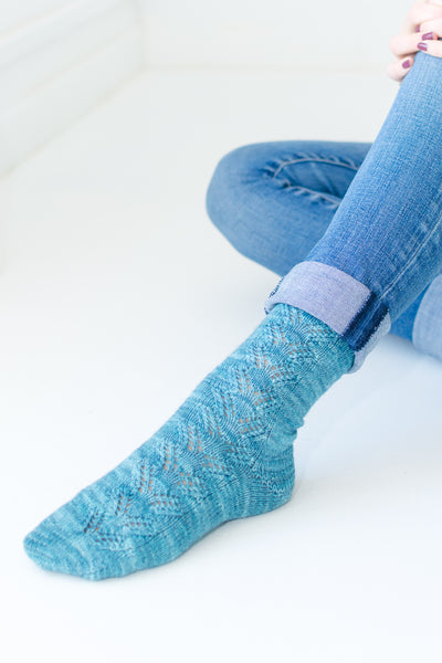 Sample of socks knit from designer knitting pattern