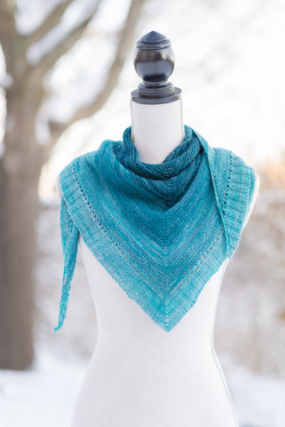 Triangle Hand Knit scarf pattern on a dress form